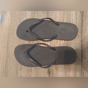 Black flip flops